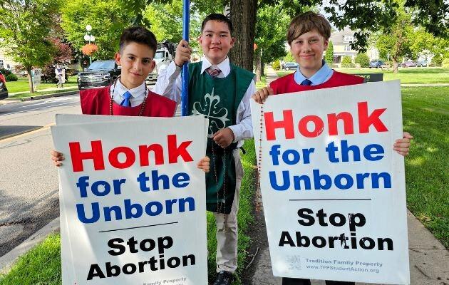 Boys at the Call to Chivalry camp defend the right to life.