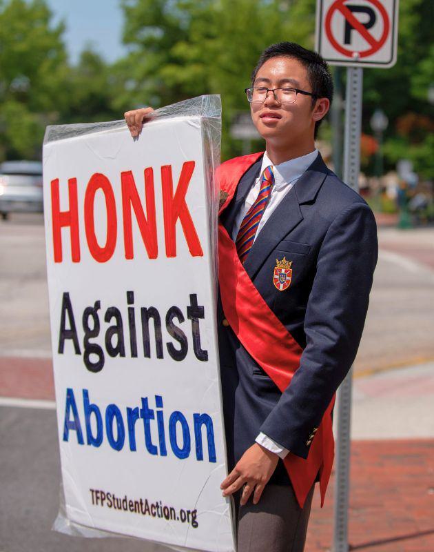 Honk against abortion sign