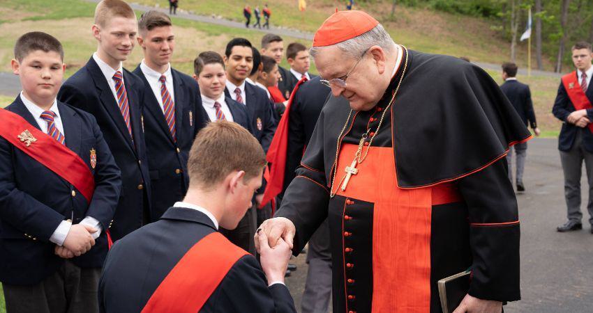 Academy students greet Cardinal Burke